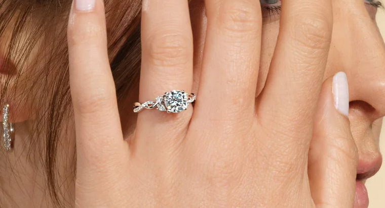Side stone engagement best sale ring