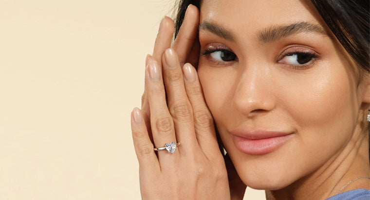 Model Displaying her Heart Shaped diamond engagement ring