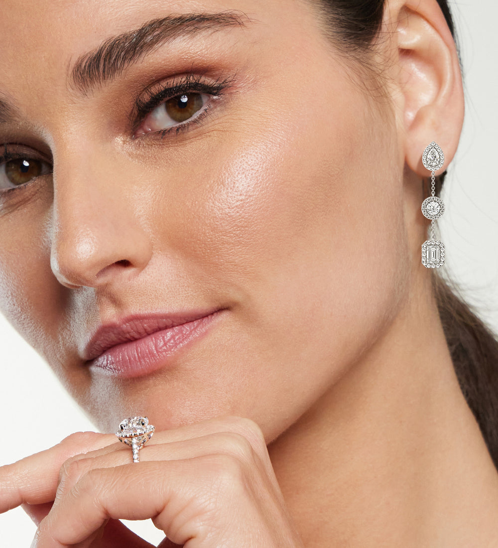 Model Wearing Mixed Shape Station Dangler Earrings view
