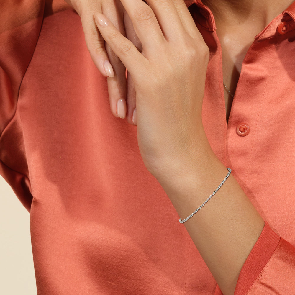 Contemporary 3-Prong Round Lab Diamond Tennis Bracelet with 1 Cut Diamond in 14KT Rose Gold view 3