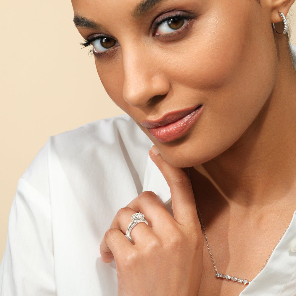 Model Wearing East West Halo Cathedral Wedding Band view