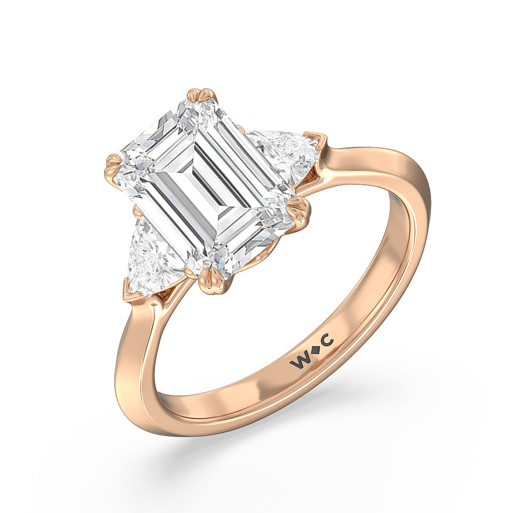 Elegance Trillion Three Stone Engagement Ring with Emerald Cut Diamond in 14KT Rose Gold view 3