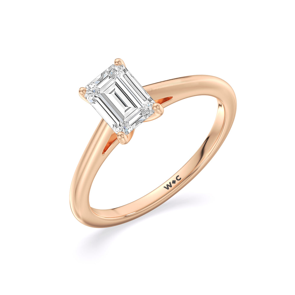 Fine Tapered Cathedral Solitaire Engagement Ring with Emerald Cut Diamond in 14KT Rose Gold view 3