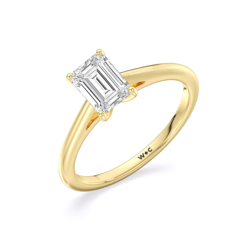 Fine Tapered Cathedral Solitaire Engagement Ring with Emerald Cut Diamond in 14KT Yellow Gold view 3