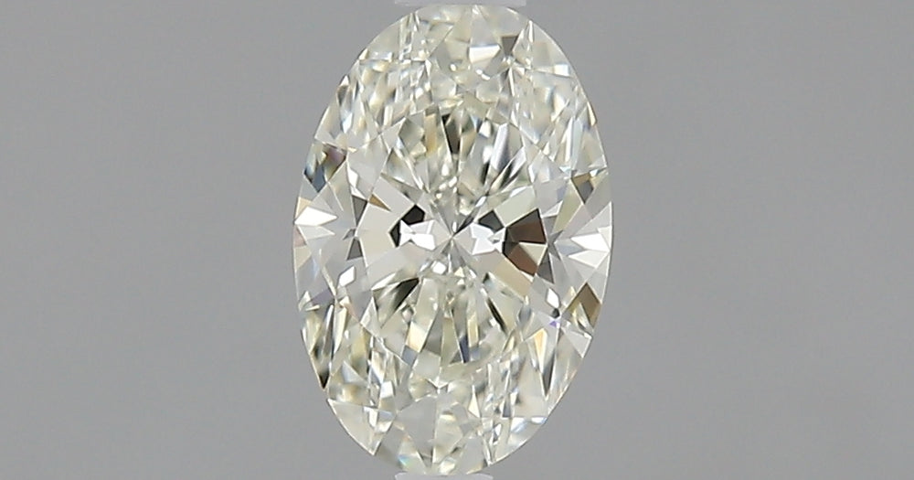 0.6 Carat Oval Natural Diamond with  Cut Diamond in 14KT  view 1