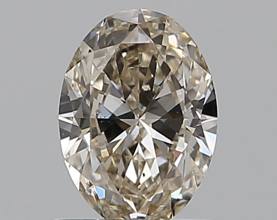 0.7 Carat Oval Natural Diamond with  Cut Diamond in 14KT  view 1