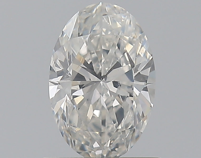 0.7 Carat Oval Natural Diamond with  Cut Diamond in 14KT  view 1