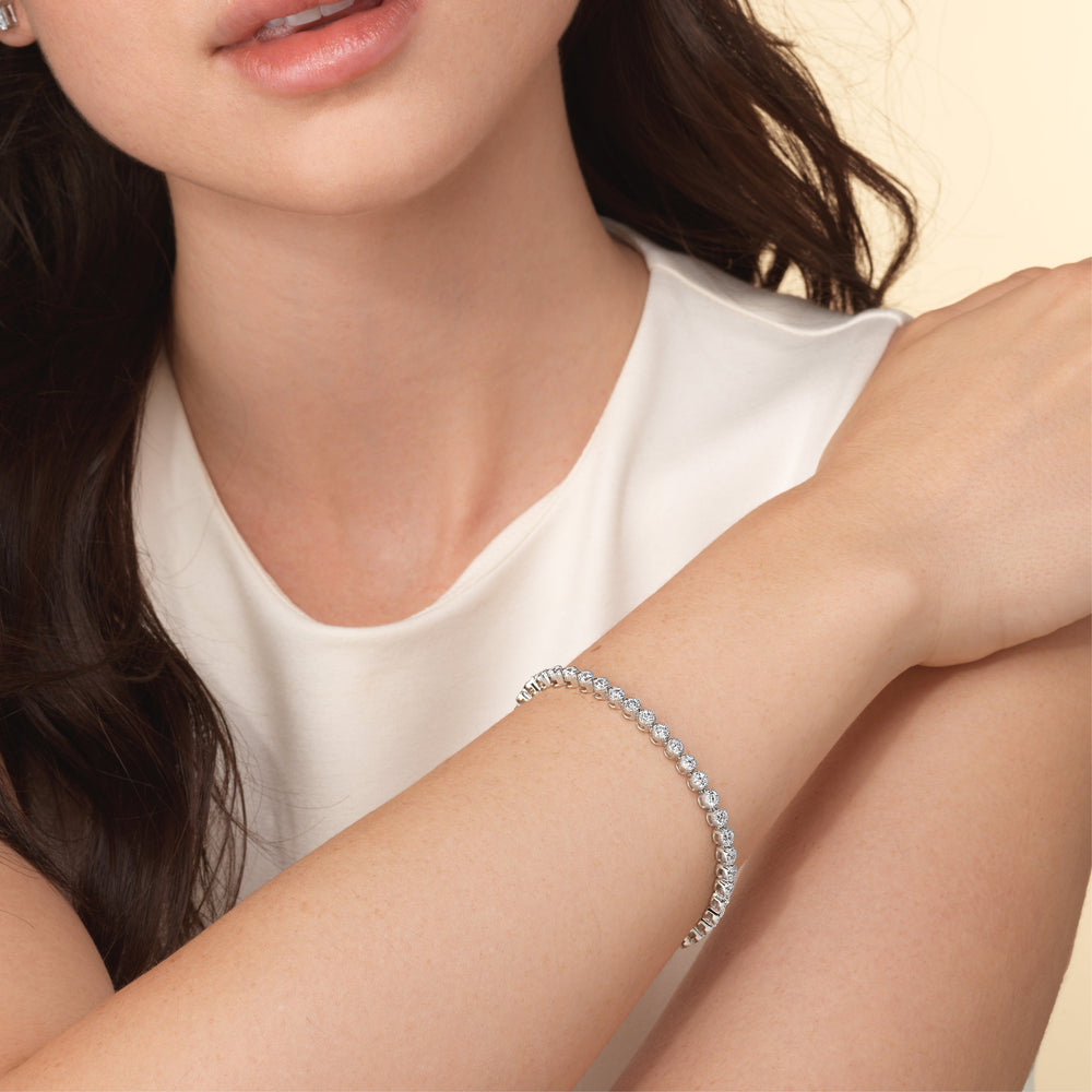 Model Wearing Round Lab Diamond Milgrain Tennis Bracelet view