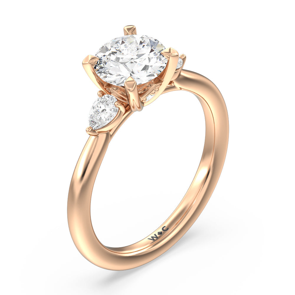 Fine Line Pear Three Stone Engagement Ring with Round Cut Diamond in 14KT Rose Gold view 3