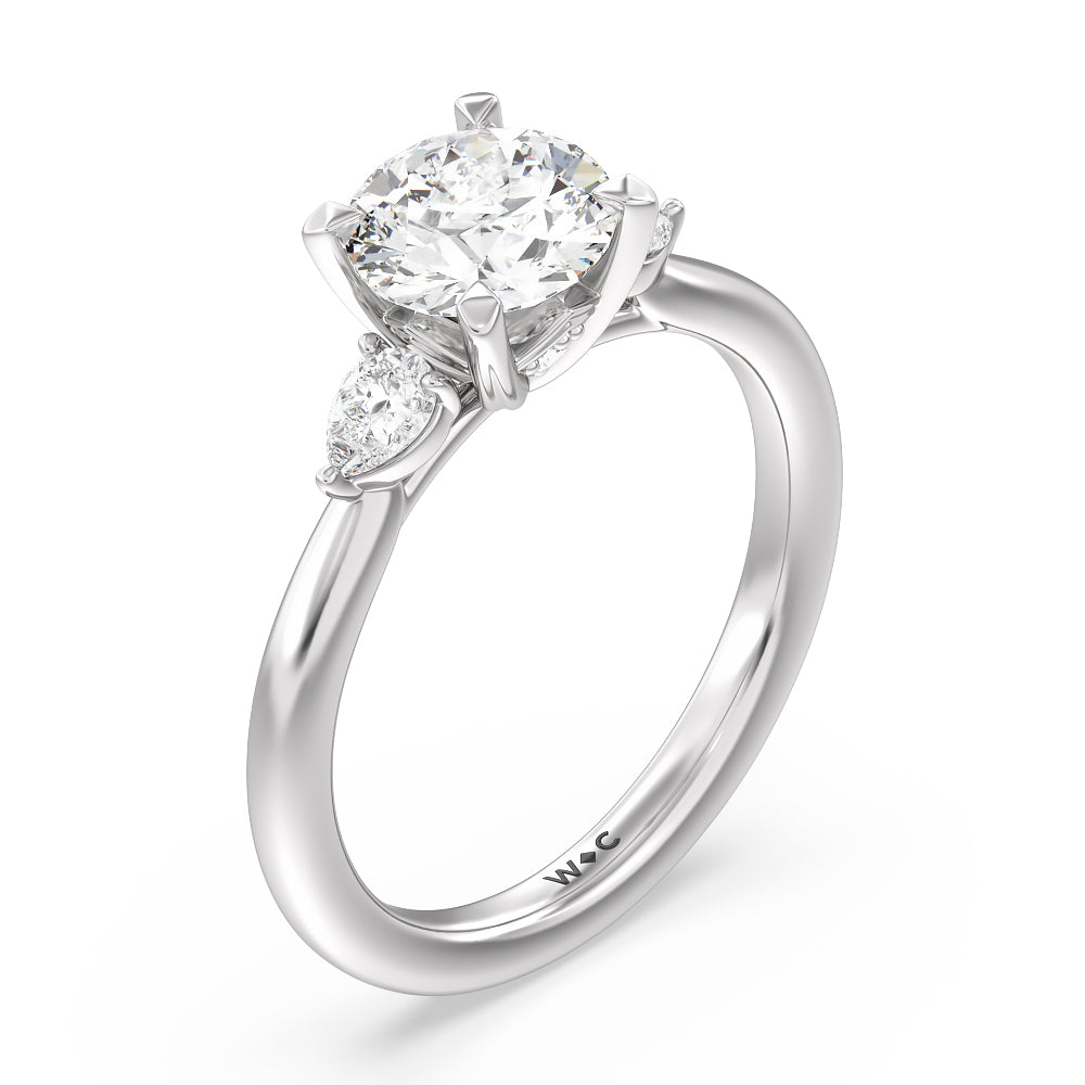 Fine Line Pear Three Stone Engagement Ring with Round Cut Diamond in 14KT Platinum view 3