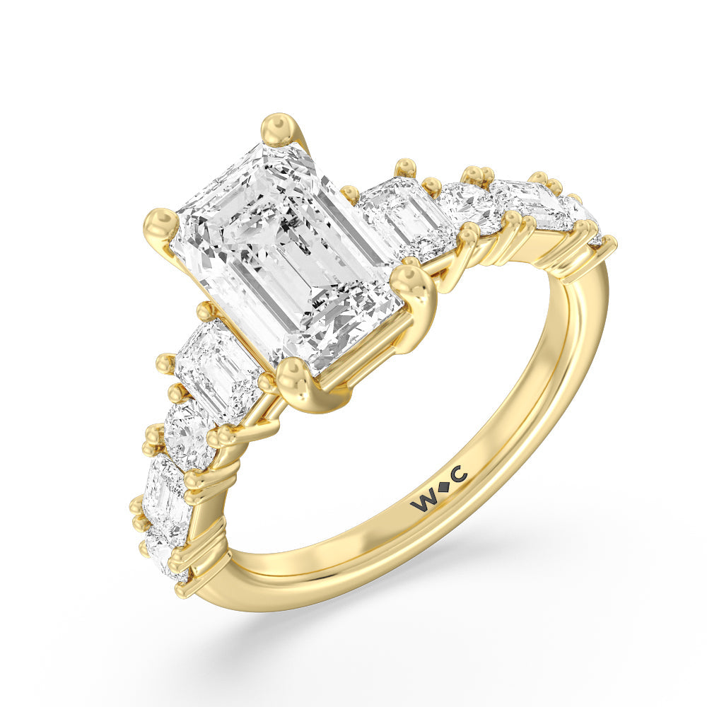 Emerald Cut Emerald and Round Side Stone Engagement Ring with Lab Grown Diamond in 14KT Yellow Gold view 3
