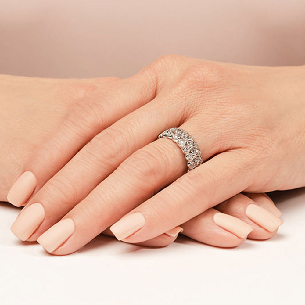 Model Wearing Love Knot Rounded Criss Cross Eternity Ring view