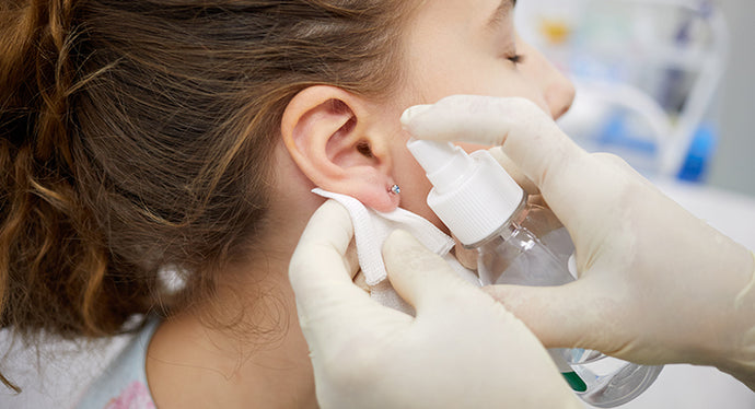 Signs of an Ear Piercing Infection & How to Treat an Infected Cartilage or  Ear Bump in Draper, UT - Century Medical & Dental Center