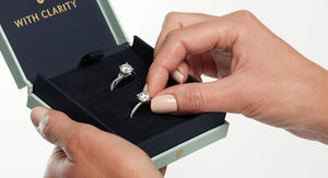 Woman displaying her engagement ring