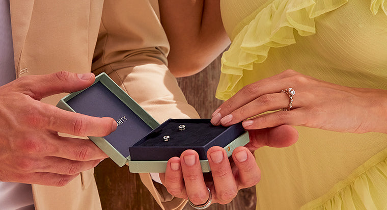 Man Gifting Stud Earrings on Anniversary