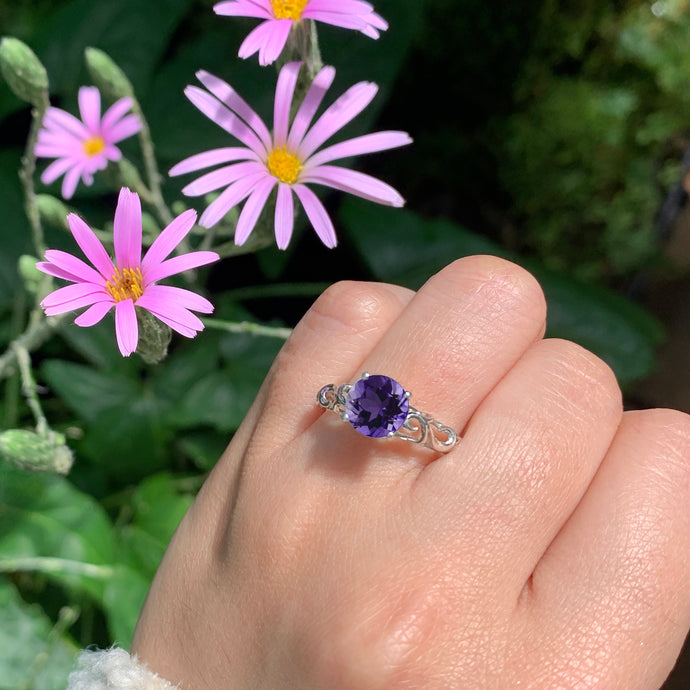 Scroll solitaire amethyst ring banner
