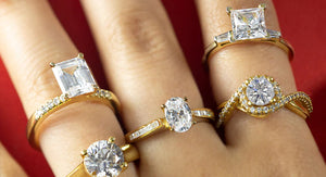 Yellow-gold diamond engagement rings in various shapes