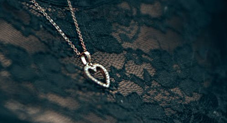 heart shaped jewelry: yellow gold necklace, rose gold necklace, white gold ring, white gold ring