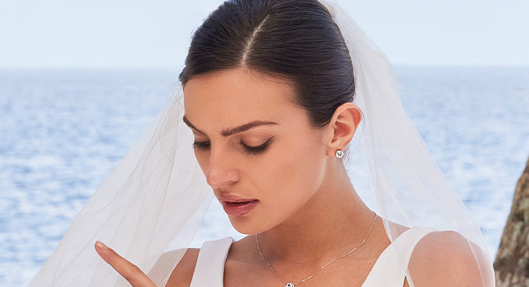 Woman wearing Lab grown diamond stud earrings on her wedding