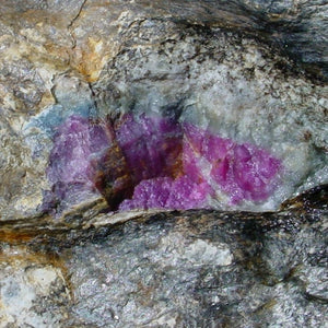 ruby forming in rough rock formations