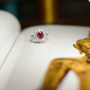 ruby ring on open book