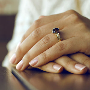 womans hands wearing ring with chocolate diamonds