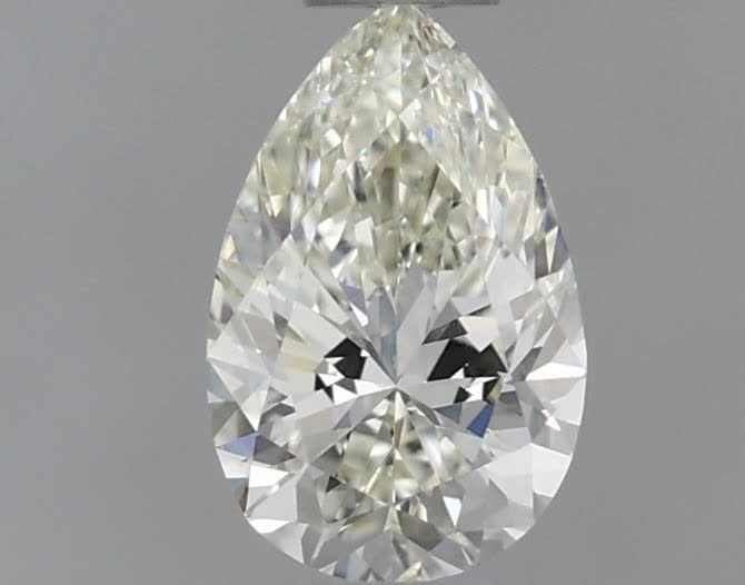 0.4 Carat Pear Natural Diamond with  Cut Diamond in 14KT  view 1
