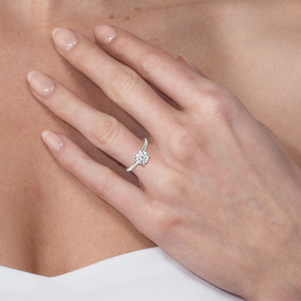 Model Wearing Classic Four Prong Solitaire Diamond Engagement Ring view