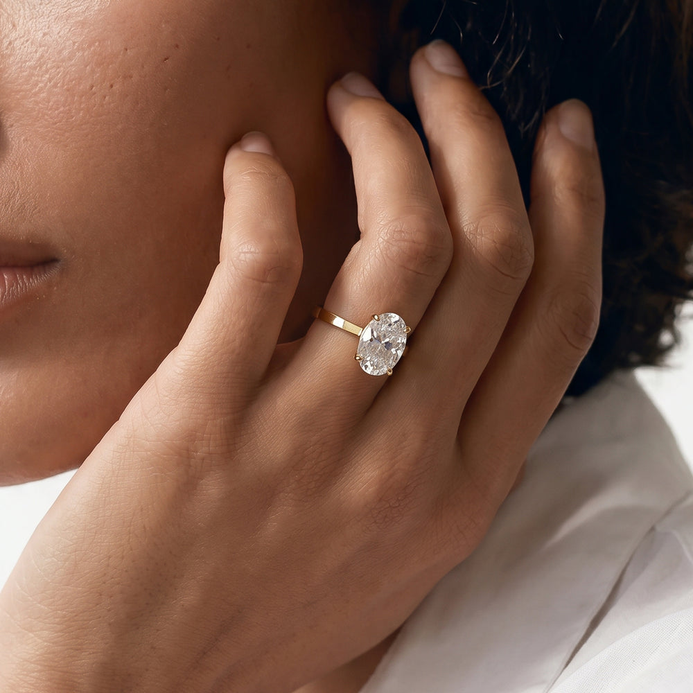 Petite Solitaire Diamond Engagement Ring with Pear Cut Diamond in 14KT Rose Gold view 2
