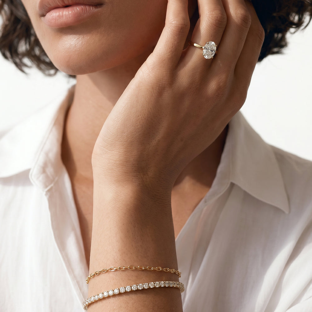 Petite Solitaire Diamond Engagement Ring with Marquise Cut Diamond in 14KT Rose Gold view 3
