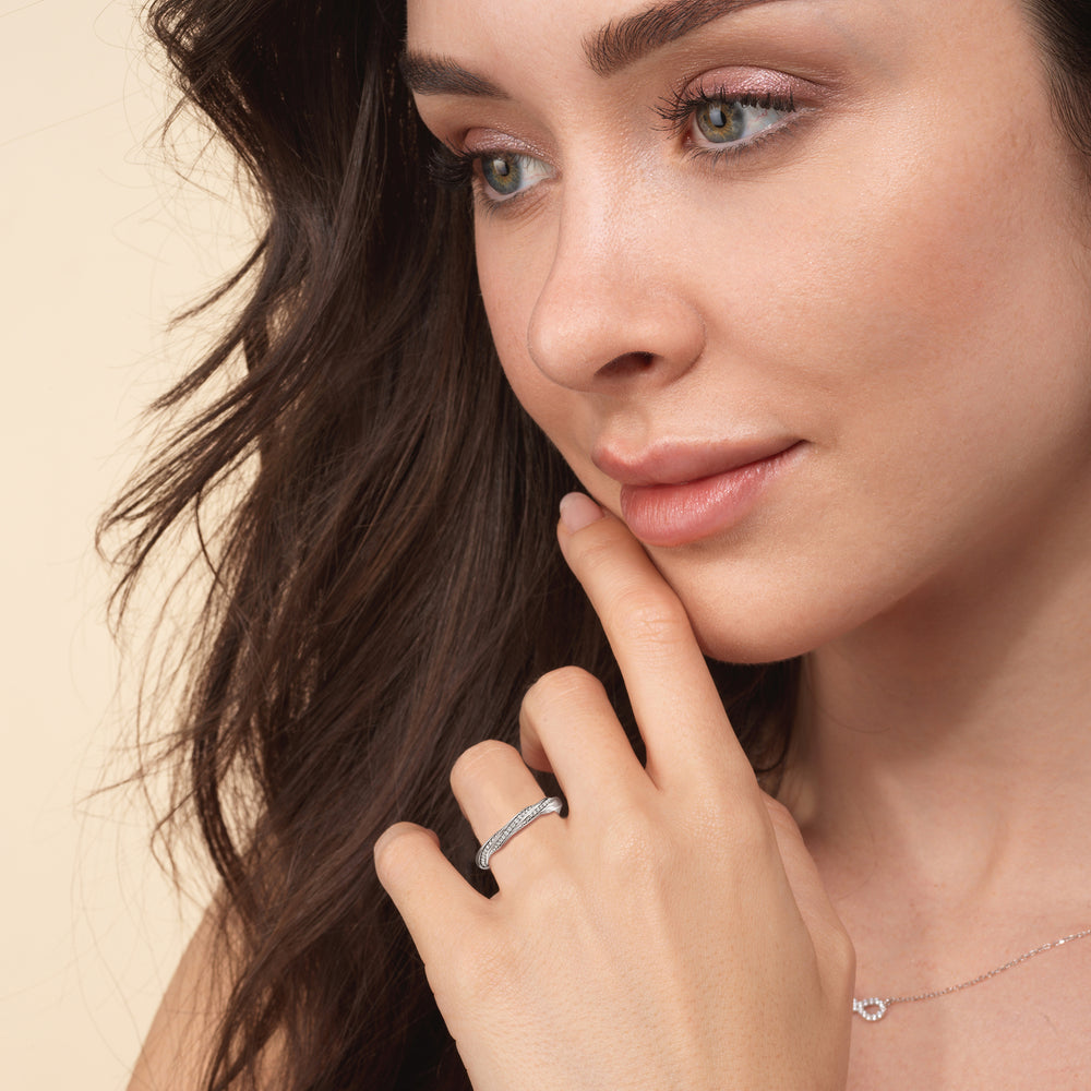Model Wearing Diamond Twist Hidden Accent Wedding Band view
