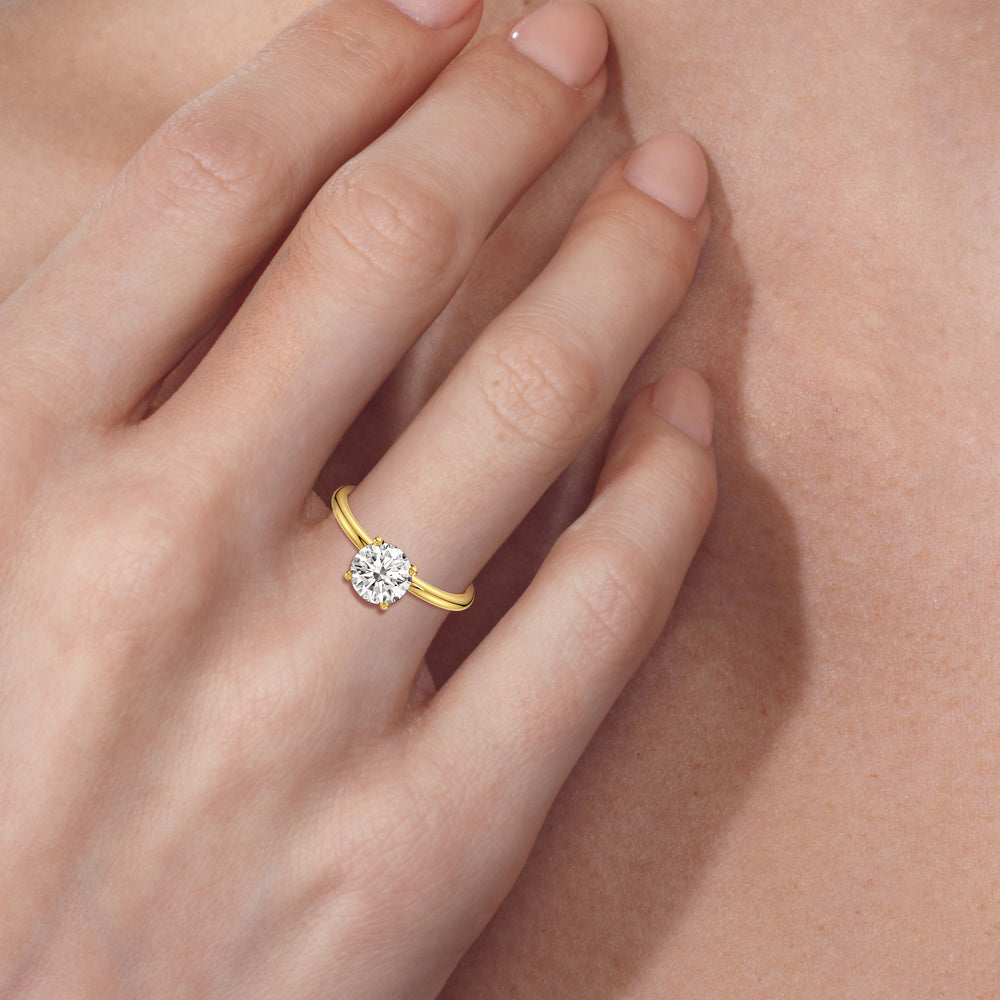 Model Wearing Classic Four Prong Petite Comfort Fit Solitaire Engagement Ring view