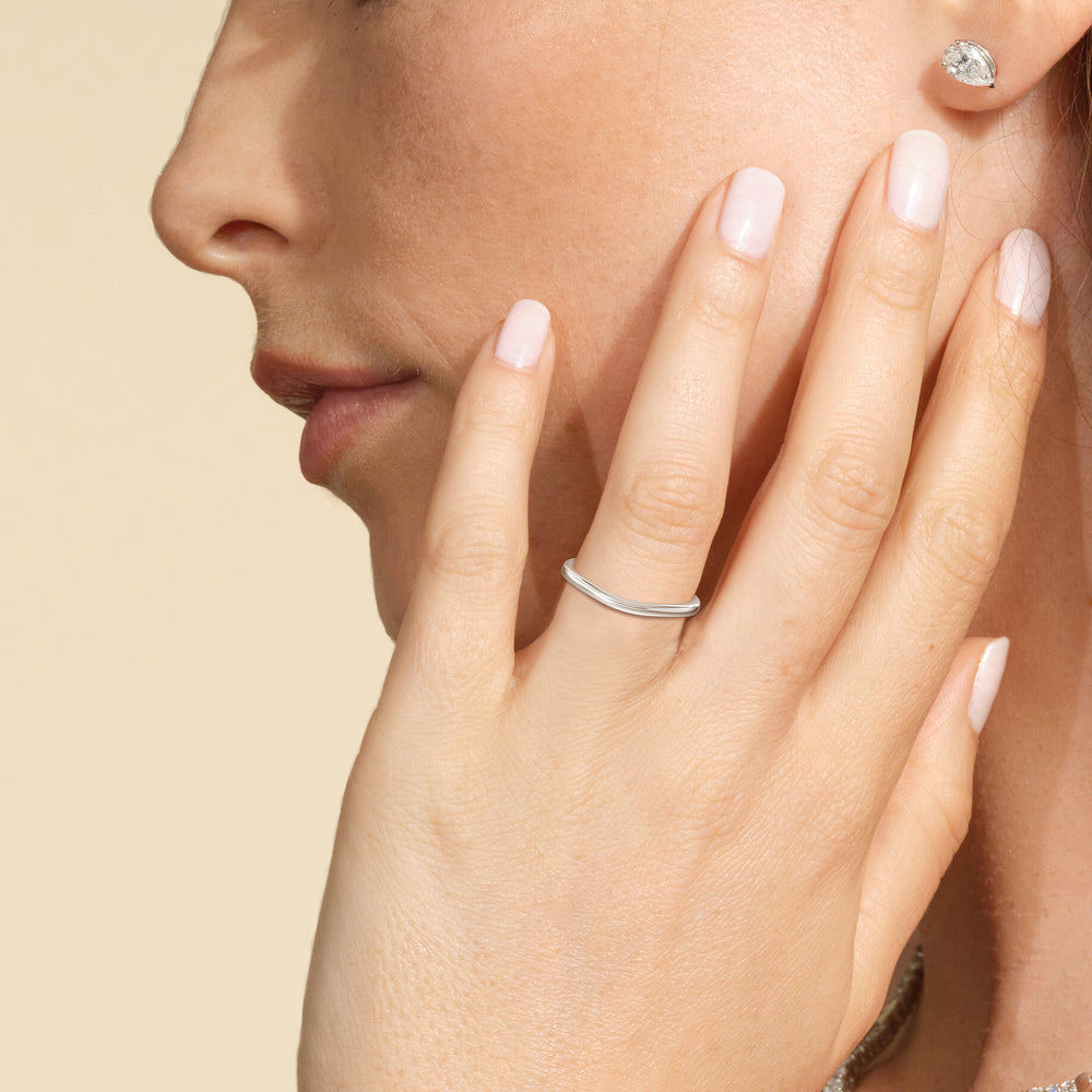 Model Wearing Three Stone Hidden Accent Bridge Classic Wedding Band view