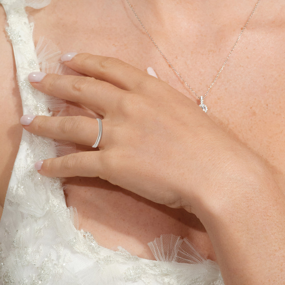 Model Wearing Floral Halo Cathedral Wedding Band view