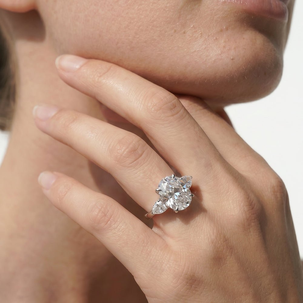 Pear Cut Elegance Pear Side Stone Engagement Ring (E+ VVS+) with Lab Grown Diamond in 14KT Yellow Gold view 2
