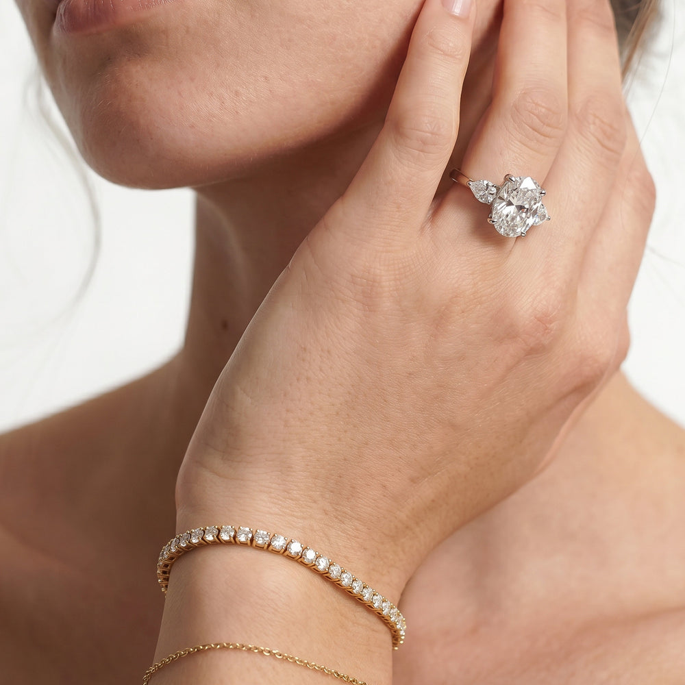 Pear Cut Elegance Pear Side Stone Engagement Ring (E+ VVS+) with Lab Grown Diamond in 14KT Platinum view 3
