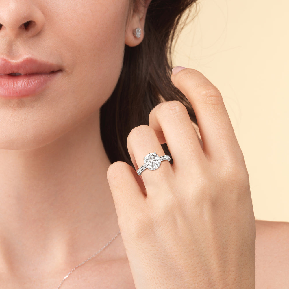Model Wearing Collared Scalloped Hidden Halo Engagement Ring view