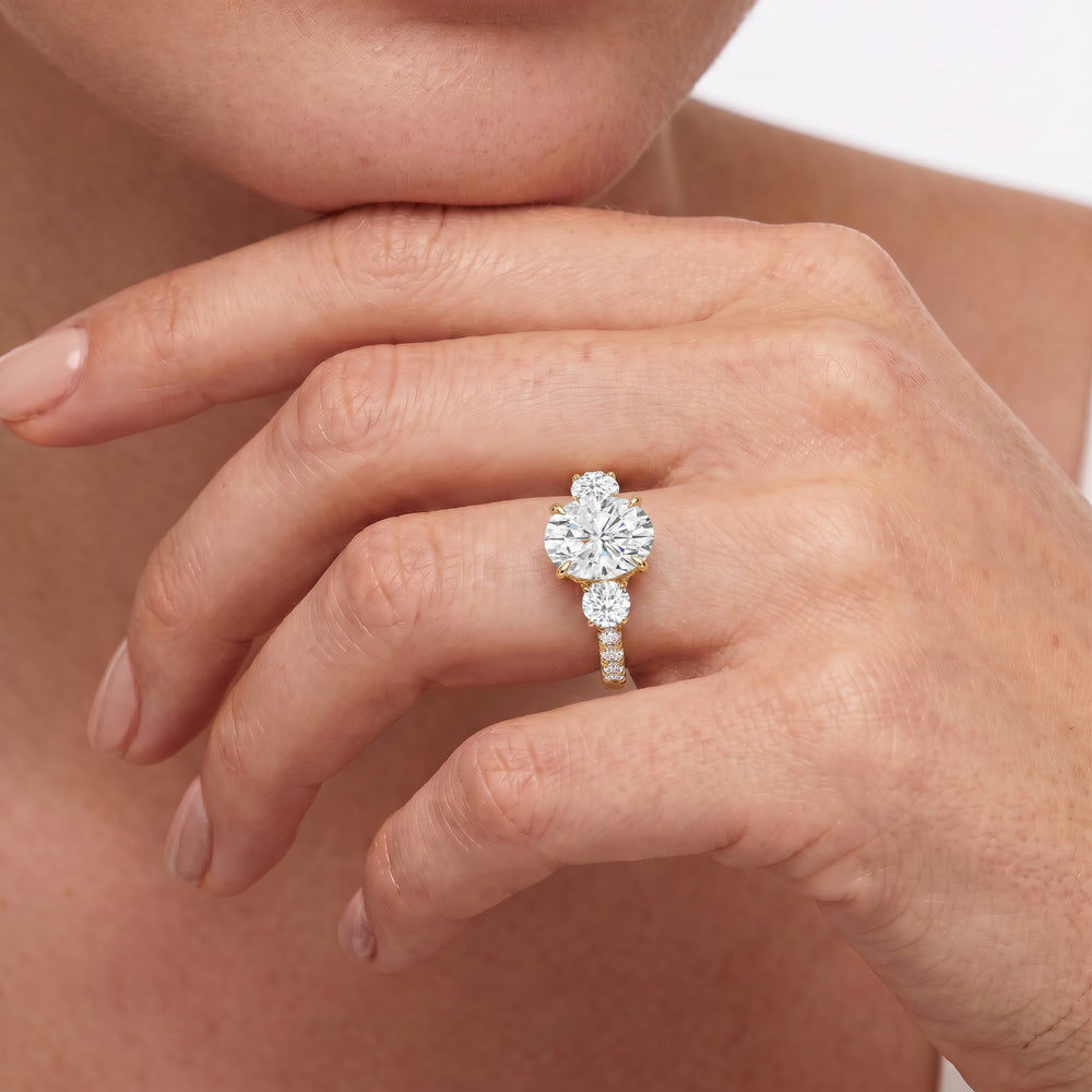 Brilliant Trio Cathedral Ring with Emerald Cut Diamond in 14KT Yellow Gold view 4
