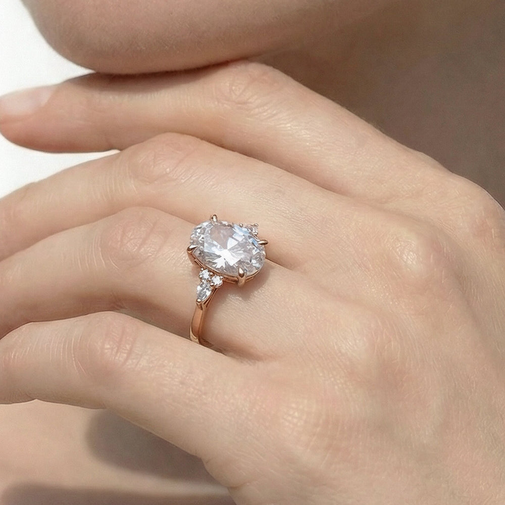 Fine Trio Cluster Engagement Ring with Oval Cut Diamond in 14KT Yellow Gold view 2
