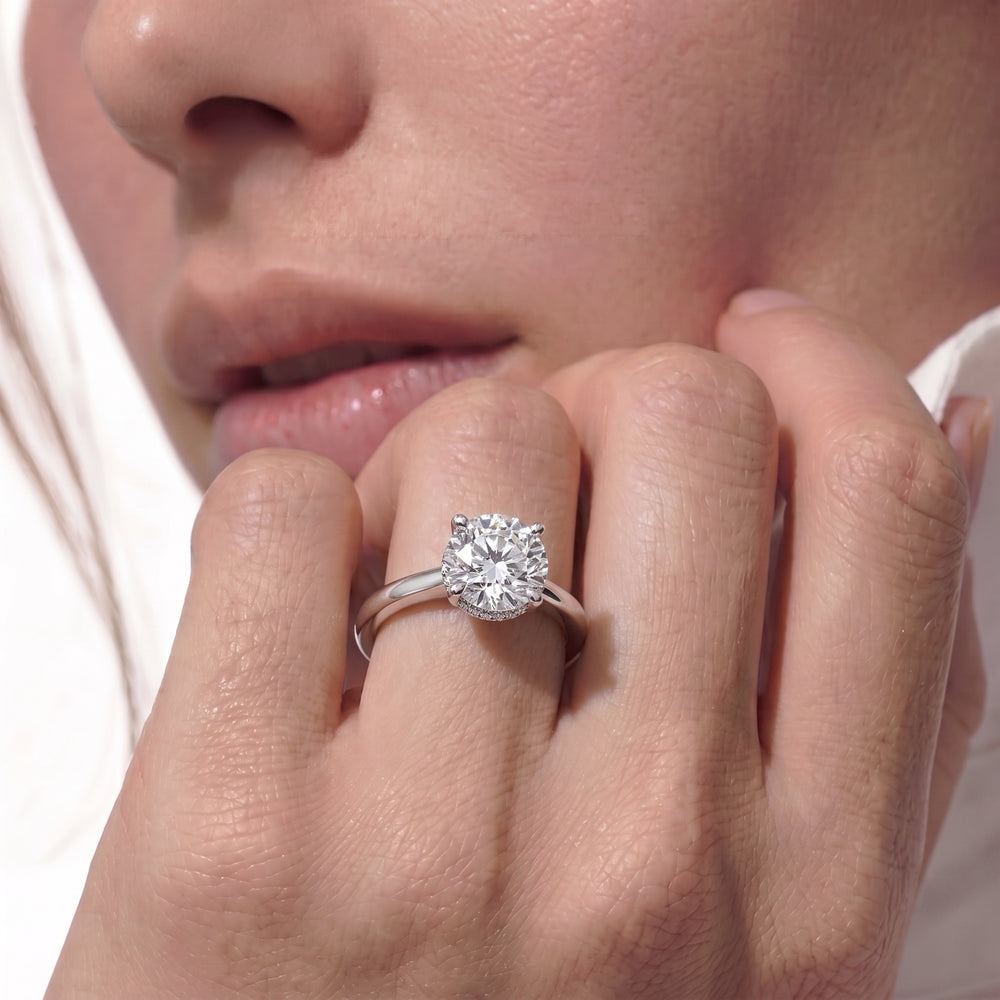 Petite Modern Fine Line High Hidden Halo Solitaire Ring with Emerald Cut Diamond in 14KT Platinum view 3
