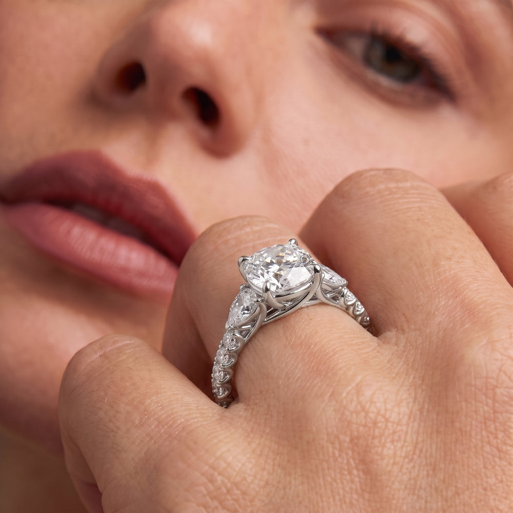 Arc Pear Engagement Ring with Emerald Cut Diamond in 14KT Platinum view 2
