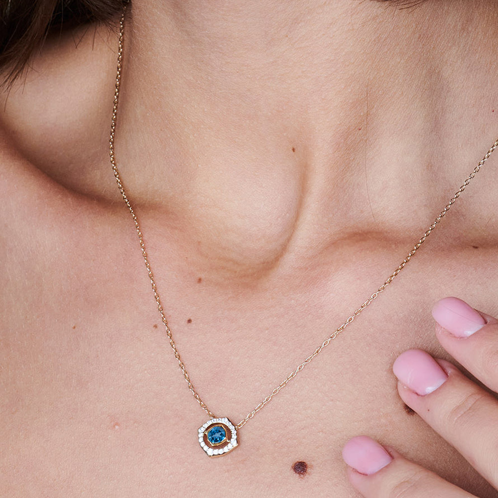 Model Wearing Signature London Blue Topaz Birthstone Necklace view