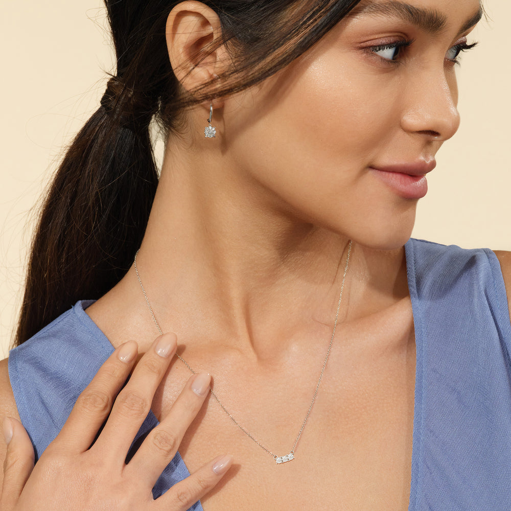 Model Wearing Dainty Three Stone Diamond Necklace view