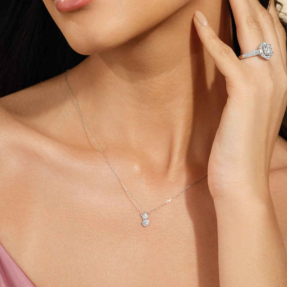 Model Wearing Toi et Moi Square Emerald and Oval Diamond Necklace view