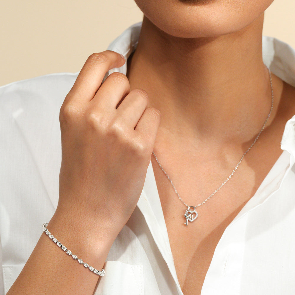Sequenced Pear and Emerald Tennis Bracelet with 5 Cut Diamond in 14KT Rose Gold view 4
