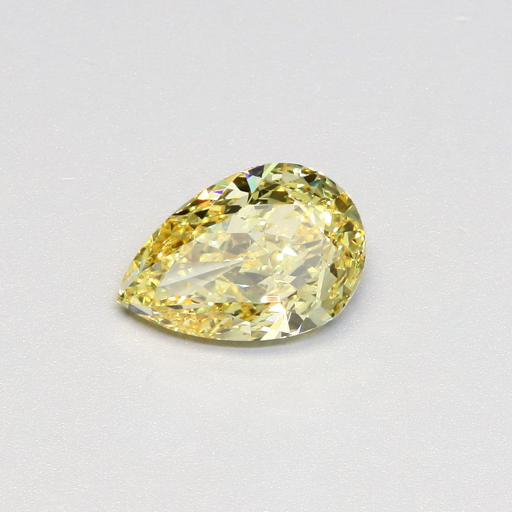 3.5 Carat Pear Lab Diamond with  Cut Diamond in 14KT  view 1
