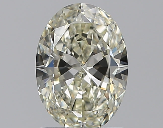 0.9 Carat Oval Natural Diamond with  Cut Diamond in 14KT  view 1
