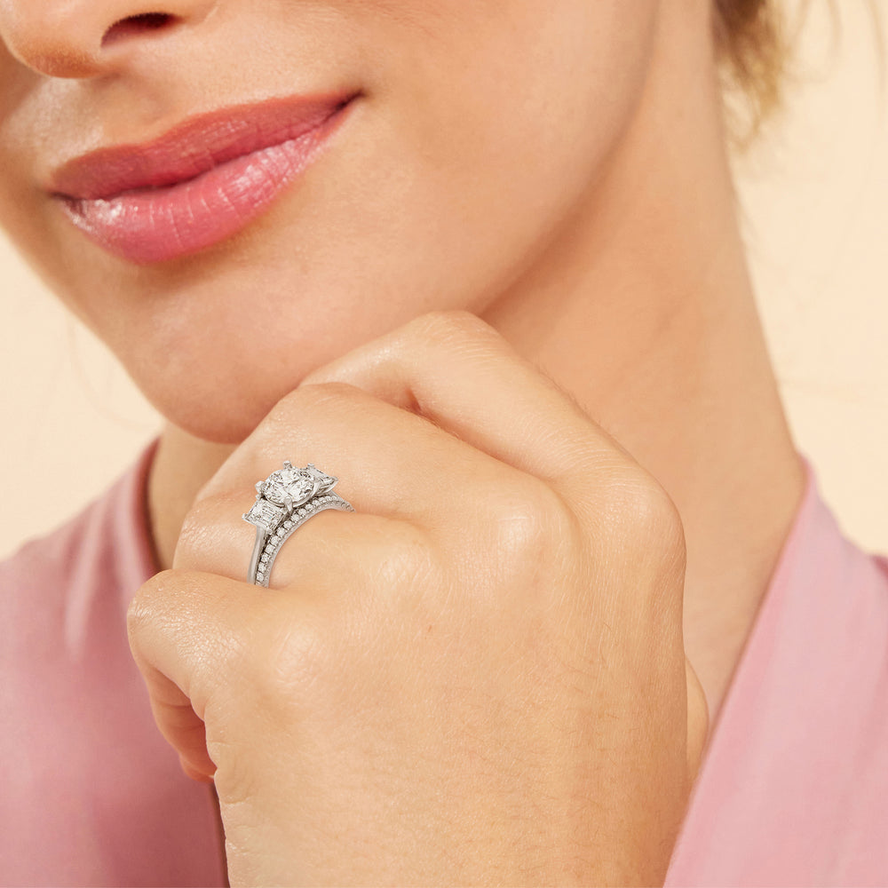Model Wearing Three Stone Hidden Accent Bridge Classic Diamond Wedding Band view