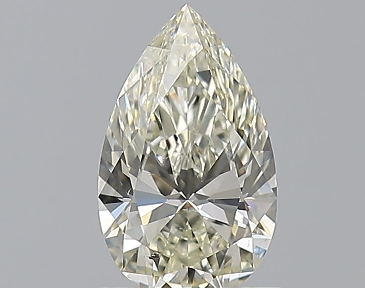 1.02 Carat Pear Natural Diamond with  Cut Diamond in 14KT  view 1
