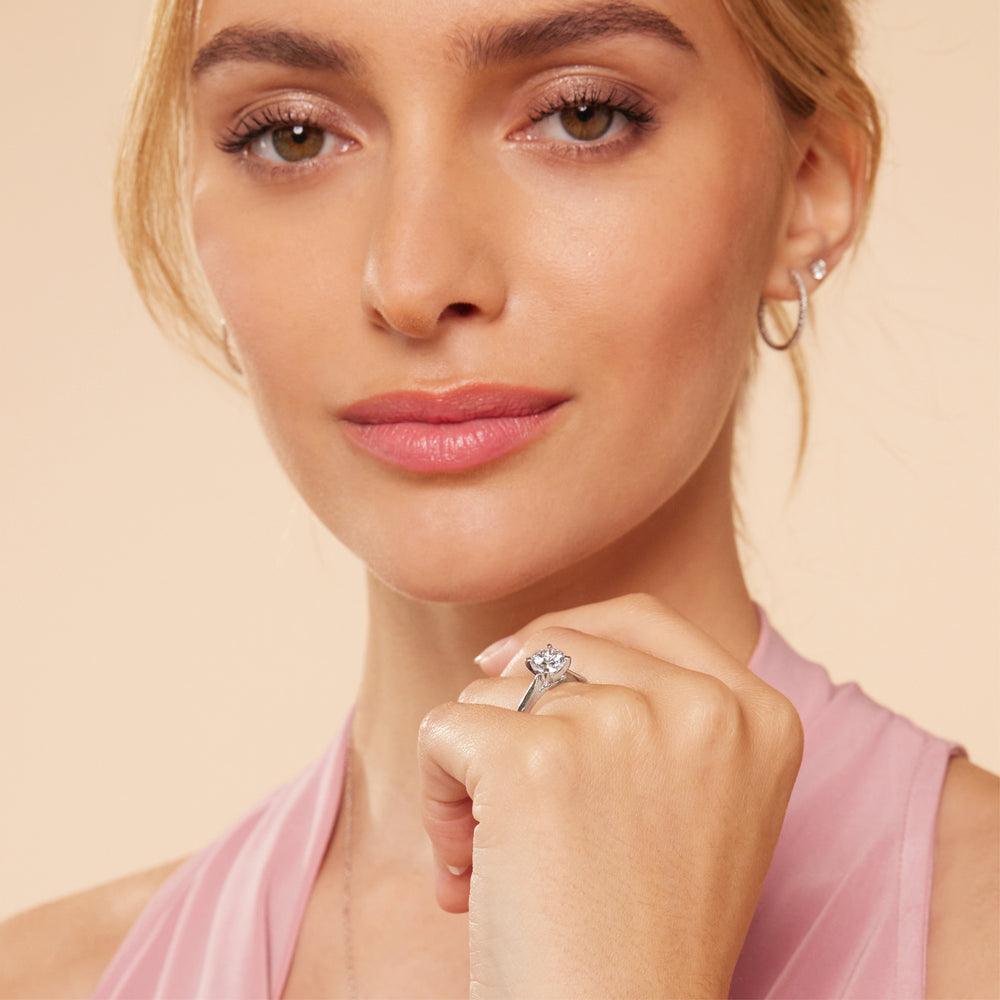 Model Wearing Medi Sleek Cathedral Solitaire Engagement Ring view